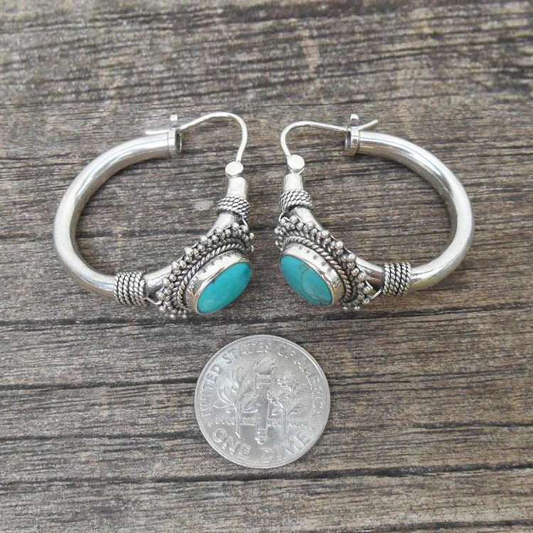 Elegante zilveren oorbellen met turquoise