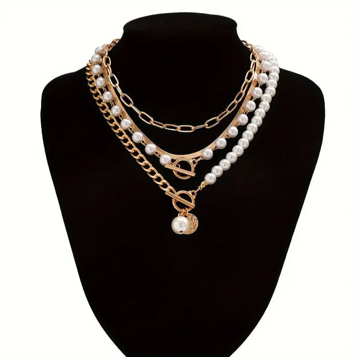 Vintage collier van parels en gouden kettingen