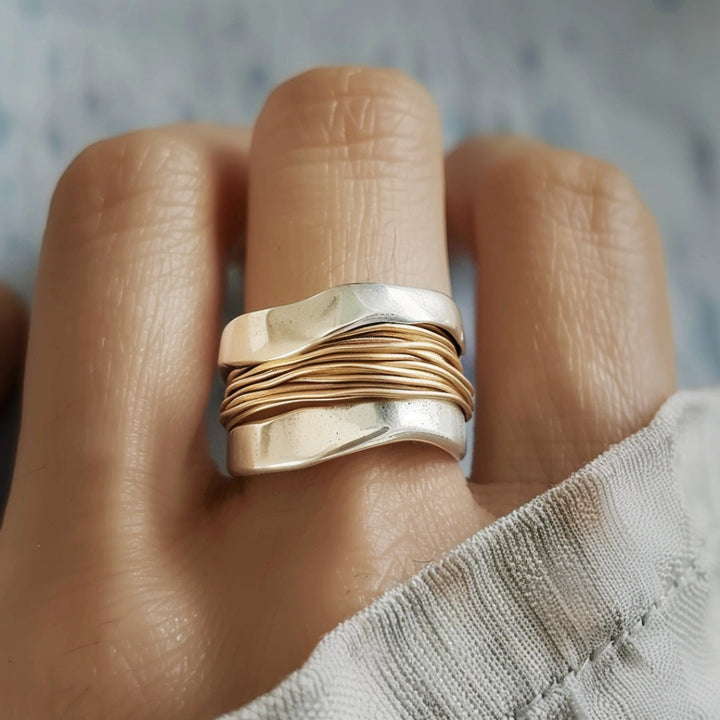Intrecciato - Zilveren ring met gouden draad