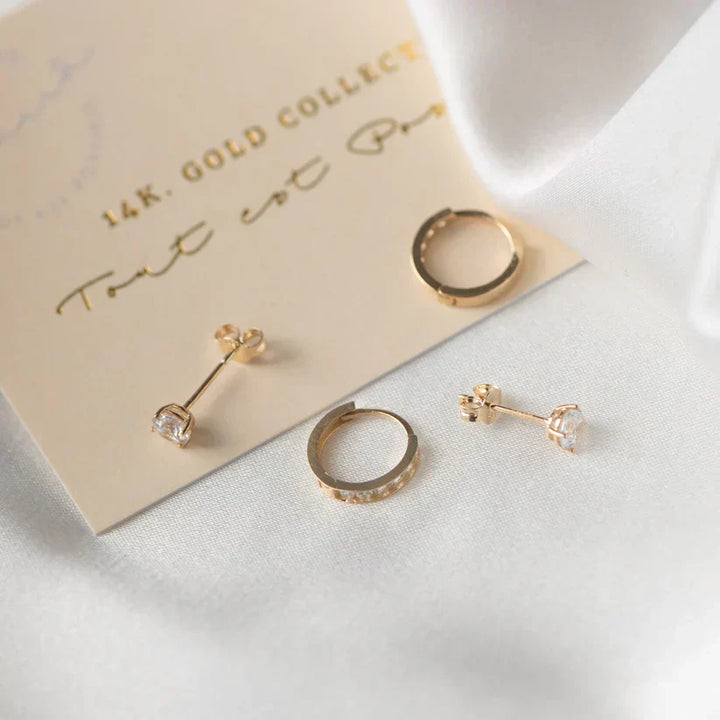 Elegante set van gouden Brillane oorbellen met stenen