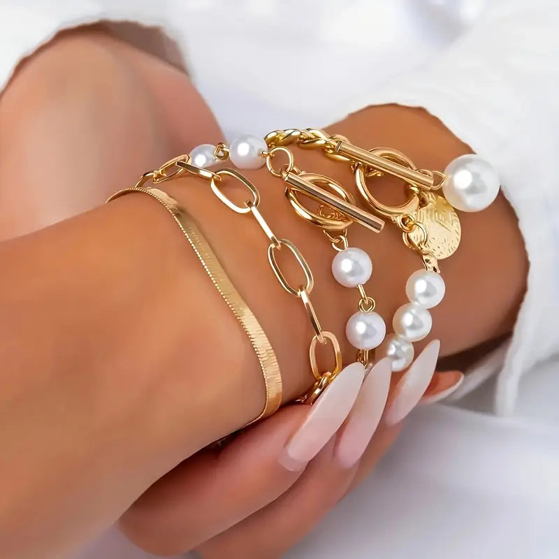 Chique gouden armbandenset (4 stuks) – slang, kralen en schakels