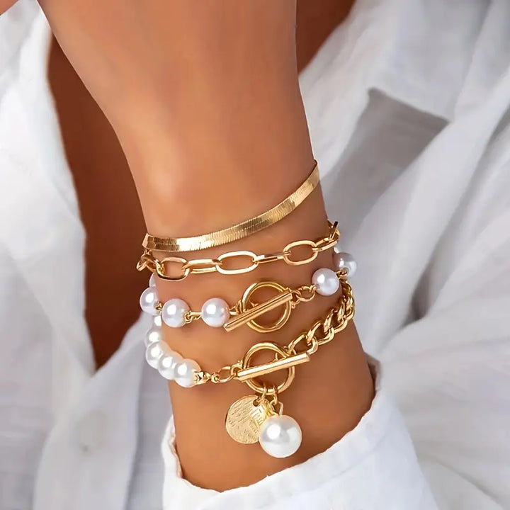 Chique gouden armbandenset (4 stuks) – slang, kralen en schakels