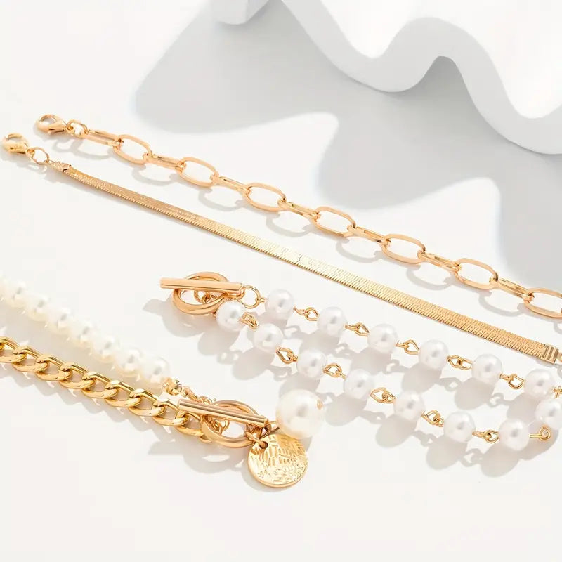 Chique gouden armbandenset (4 stuks) – slang, kralen en schakels