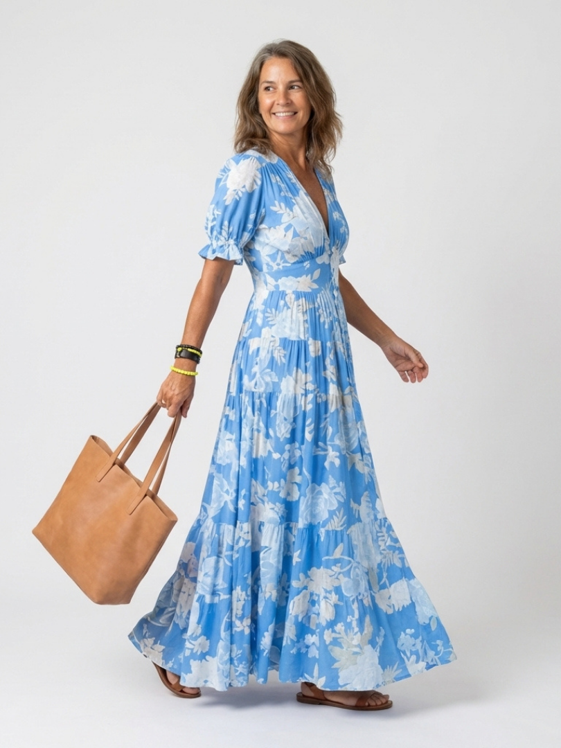 Ione | Korte mouwloze V-hals bloemen midi-jurk