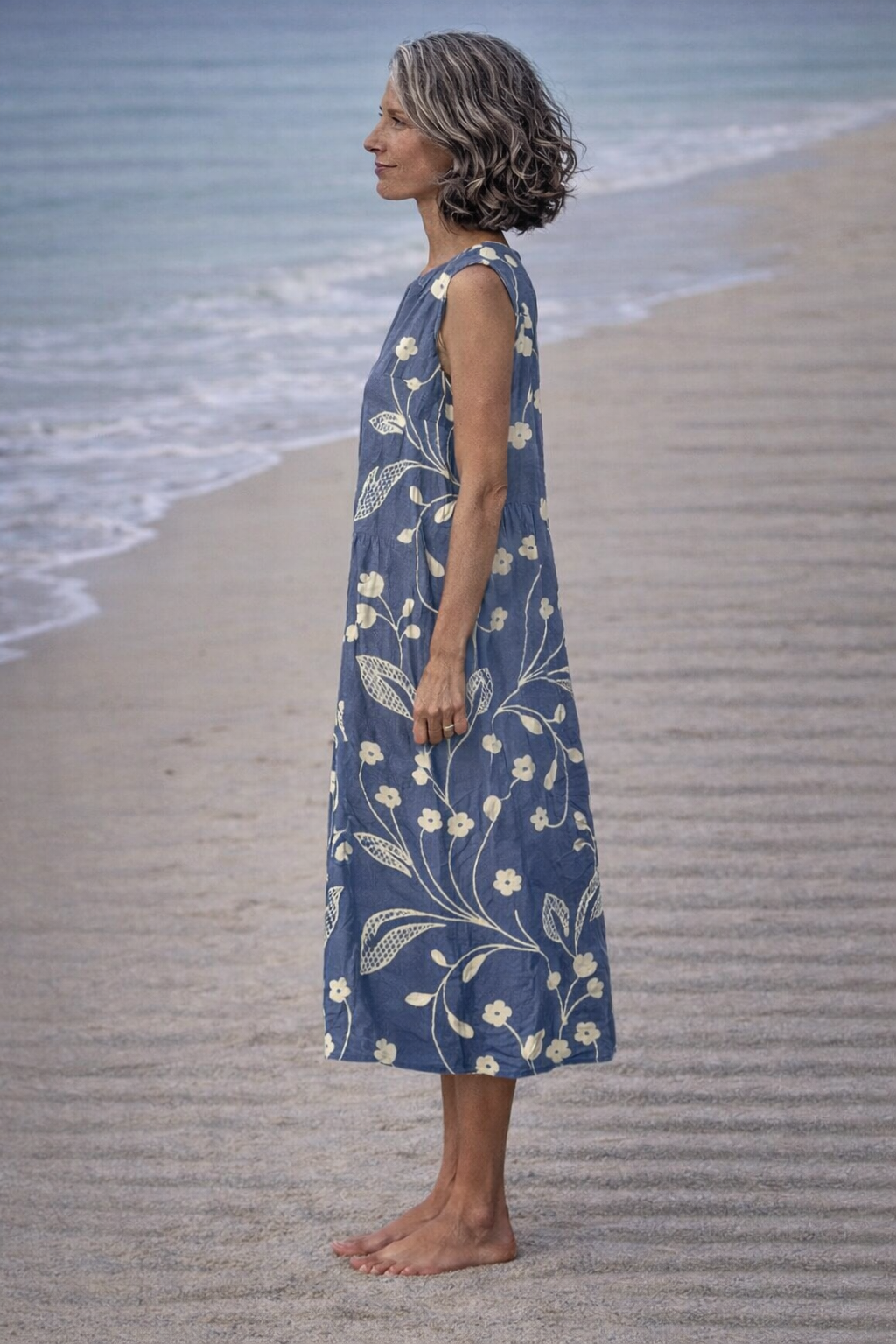 Estela | Mouwloze midi-jurk met vintage bloemen