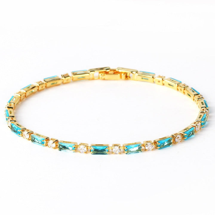 Elegante armband van natuurlijk turquoise en goud