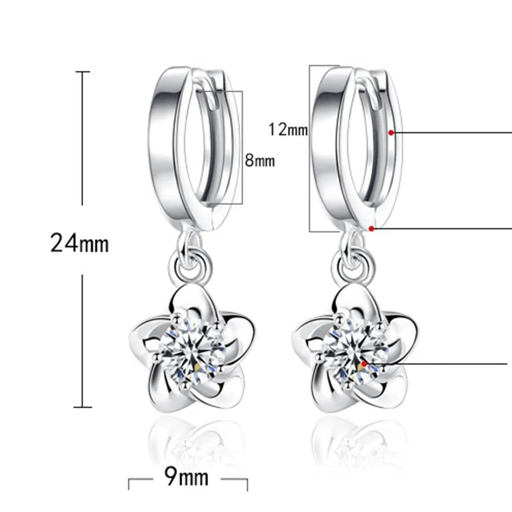 Sterling zilveren oorbellen met paarse en witte zirconia