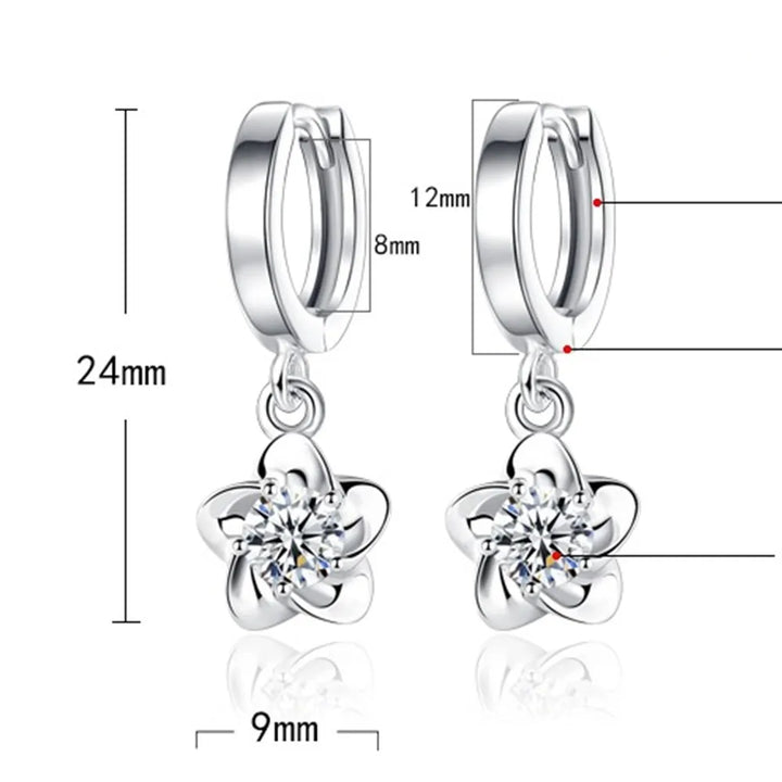 Sterling zilveren oorbellen met paarse en witte zirconia