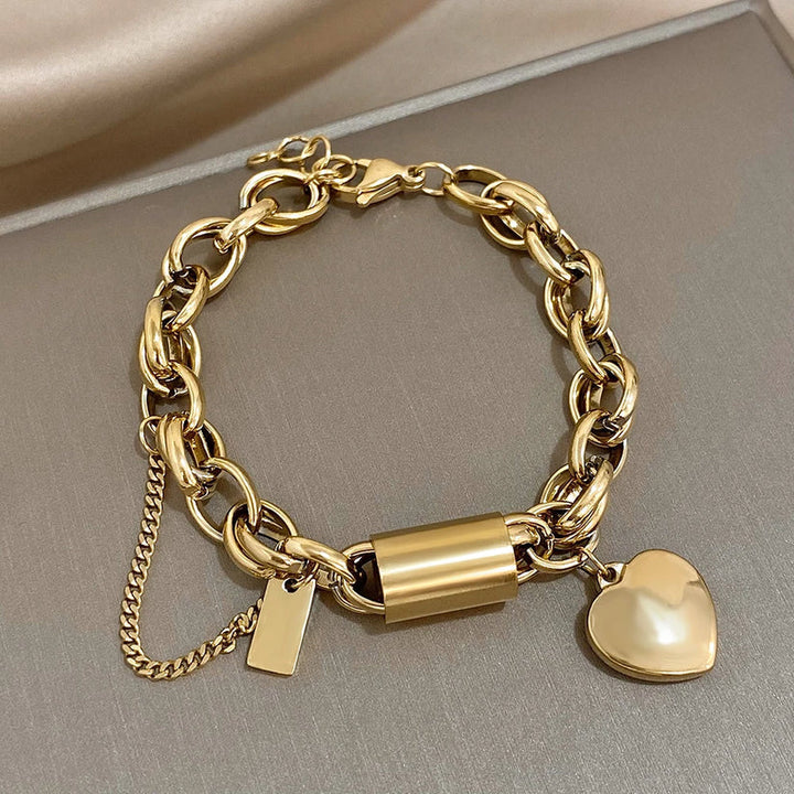 Elegante gouden armband in de vorm van een hart, dik