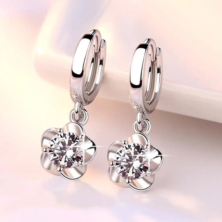 Sterling zilveren oorbellen met paarse en witte zirconia