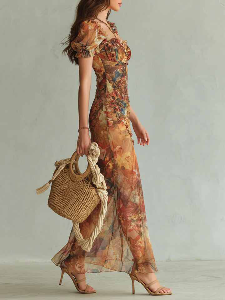 Viola - Lange chiffon jurk in oranje met olieverfprint in bohemien stijl