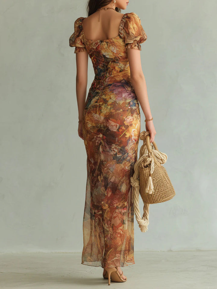 Viola - Lange chiffon jurk in oranje met olieverfprint in bohemien stijl
