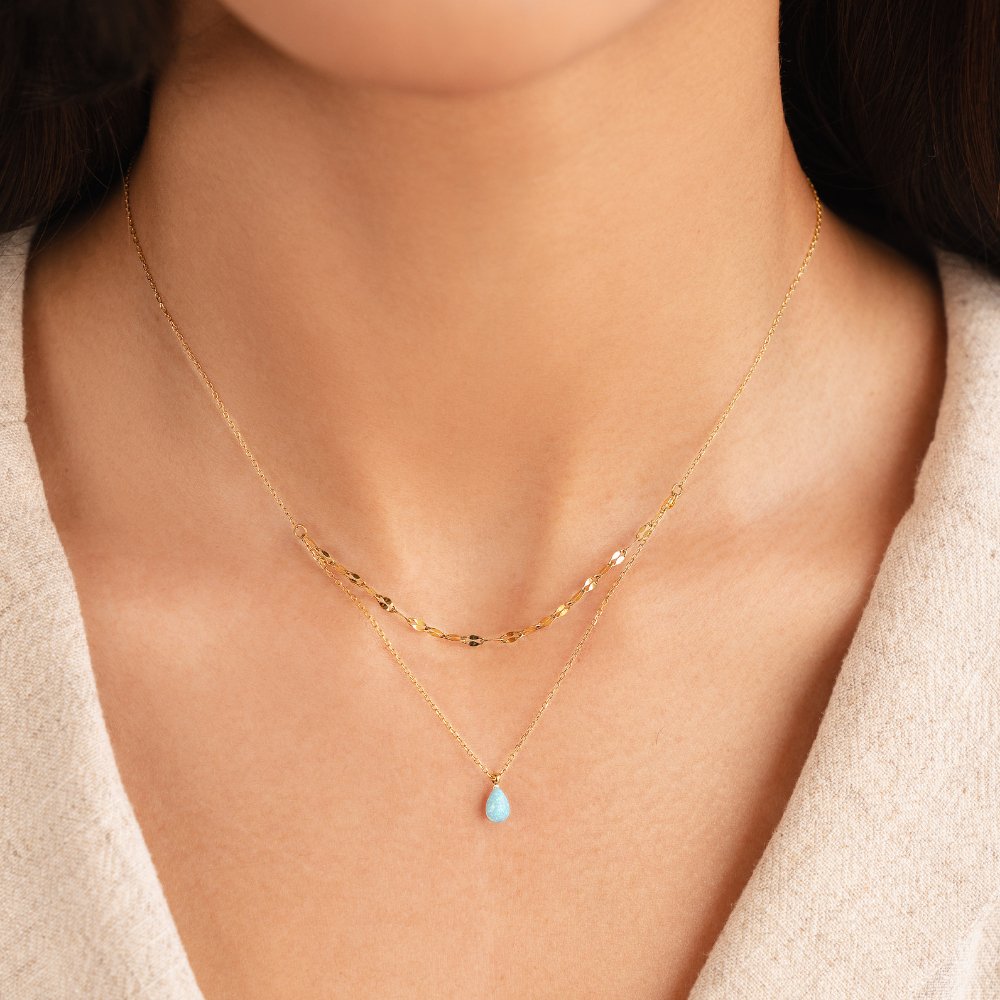 Gelaagde ketting met blauwe opaal druppel