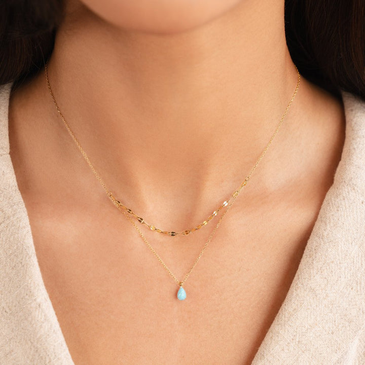 Gelaagde ketting met blauwe opaal druppel