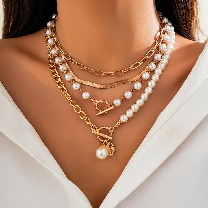 Vintage collier van parels en gouden kettingen