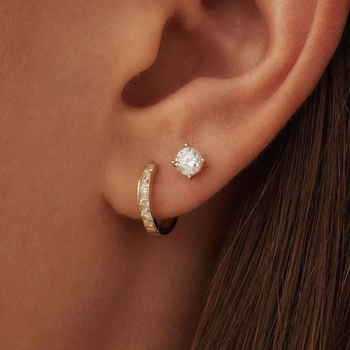 Elegante set van gouden Brillane oorbellen met stenen