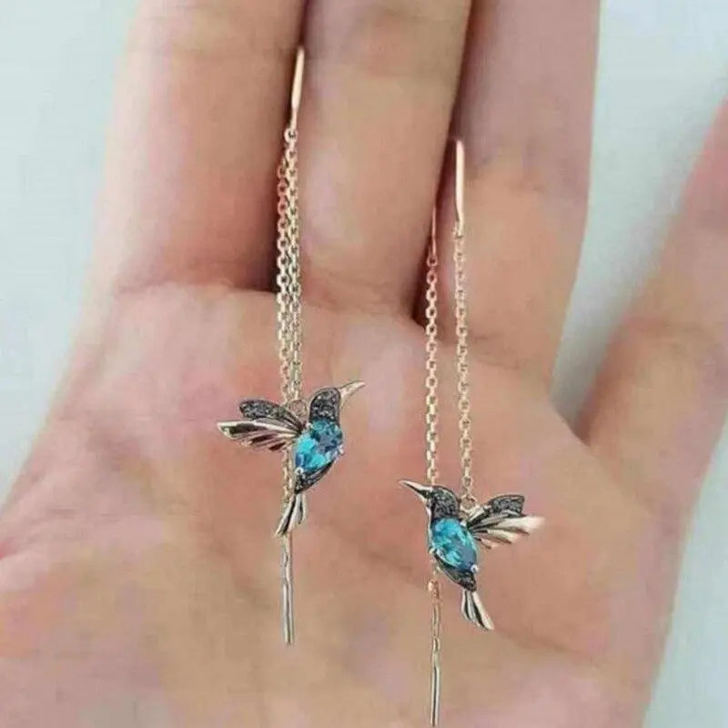 Oorbellen met kolibrie van goud en kristallen